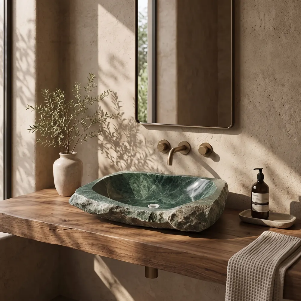 Raw-edged green marble boulder vessel sink, an Avtikes design concept